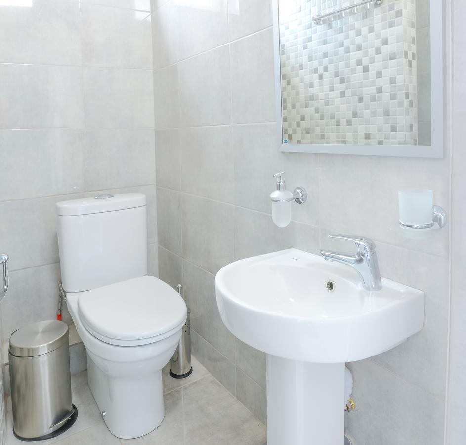 Captain Hotel Zatoka Luaran gambar