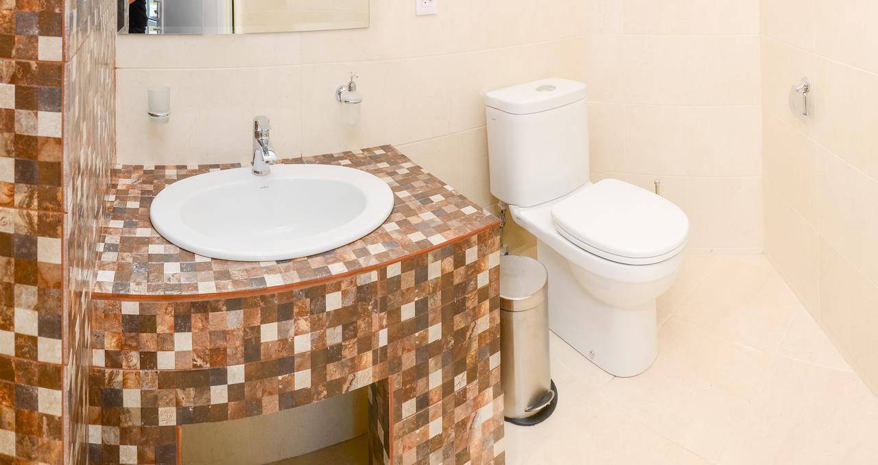 Captain Hotel Zatoka Luaran gambar