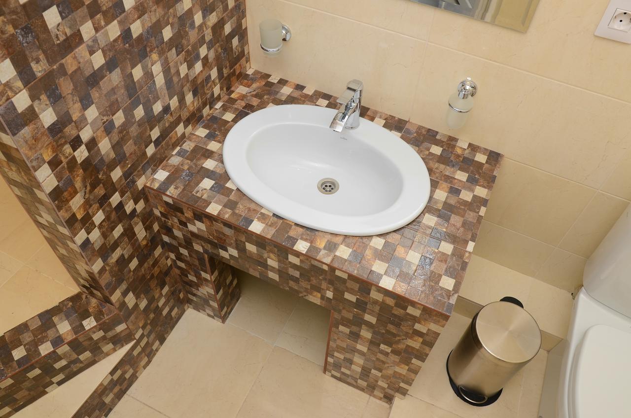 Captain Hotel Zatoka Luaran gambar